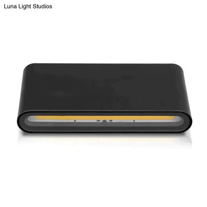 Black rectangular luna outdoor wall light with sleek modern design and integrated warm yellow led strip for outdoor use