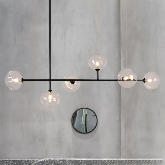 Modern black metal chandelier with five clear glass globe bulbs and bulb base for stylish restaurant ambiance lighting