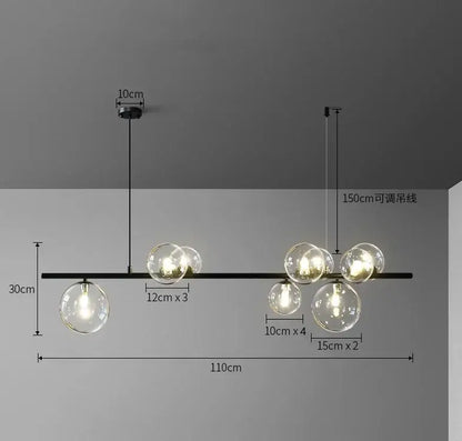 Modern black metal clear glass led chandelier with globe bulbs arranged on a horizontal bar for dining room decorbites clear glass