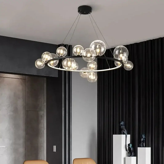 Modern black metal chandelier with clear glass led globe bulbs arranged in a circular pattern for dining room decorbites clear glass