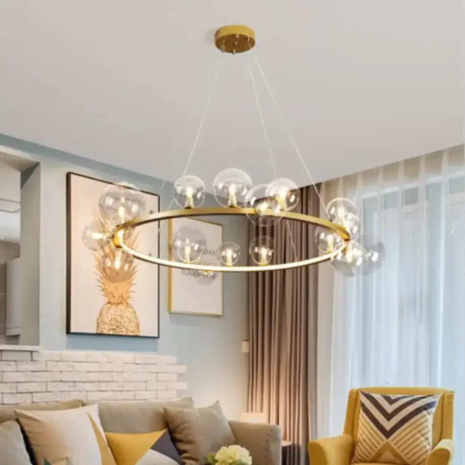 Modern black metal clear glass led chandelier with gold-toned circular frame and multiple clear glass globe bulbs for dining room decorbites clear glass