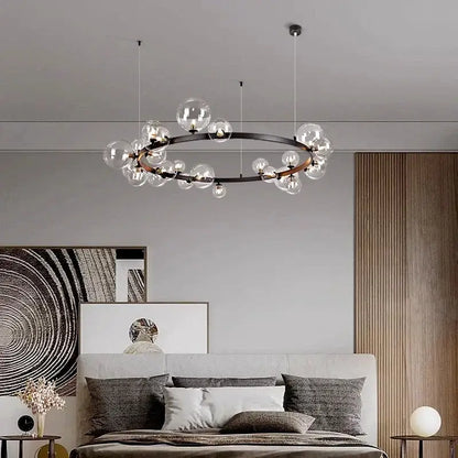 Modern black metal glass ball pendant chandelier with clear globe bulbs arranged in a circular pattern for dining room decorbites pendant chandelier