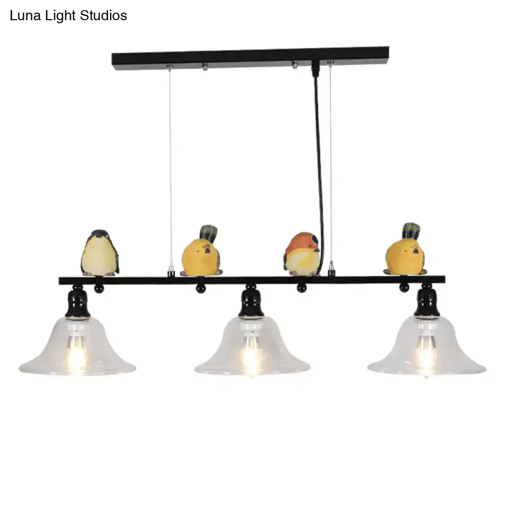 Modern black metal island pendant light with three clear glass shades and colorful bird figurines for 110v-120v use