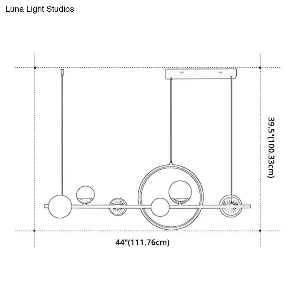 Modern black metal pendant light with spherical glass bulbs and geometric circular design for dining room