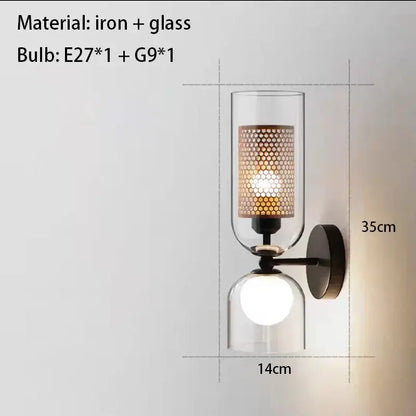 Modern black metal wall light with clear glass cylindrical frosted shade and rounded globe base for bedroom decorbites clear glass