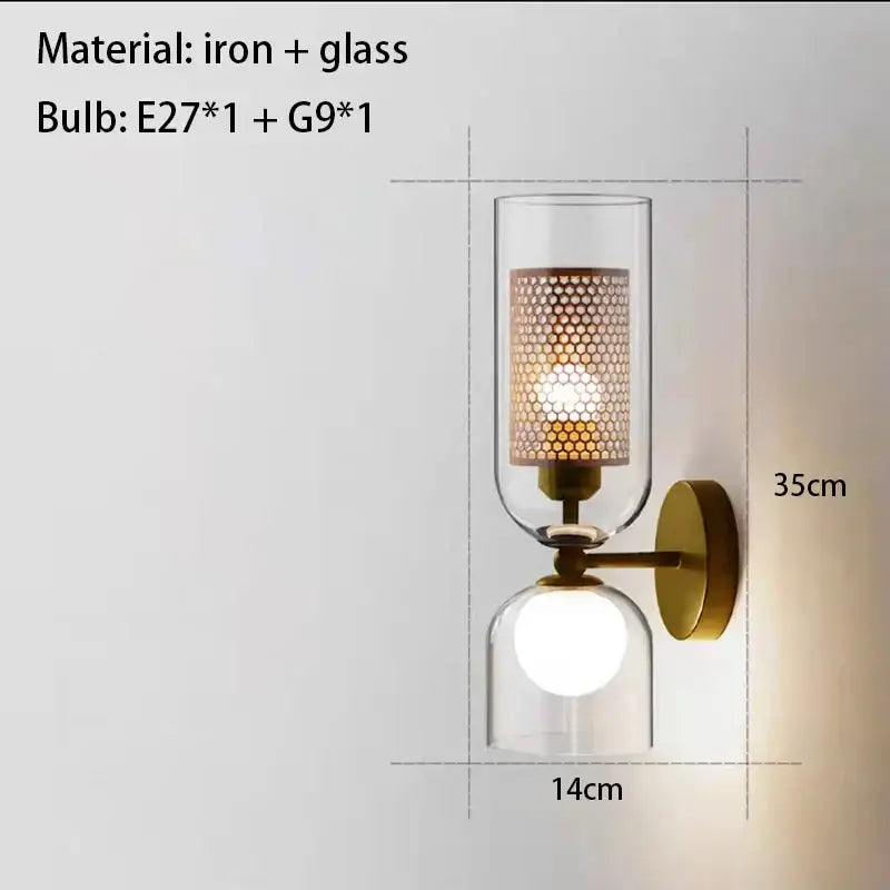 Modern black metal wall light with clear glass shade and brass honeycomb-patterned diffuser for bedroom decorbites clear glass