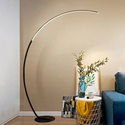 Modern black minimalist arc floor lamp with sleek curved design and dimmable integrated led lighting for living room