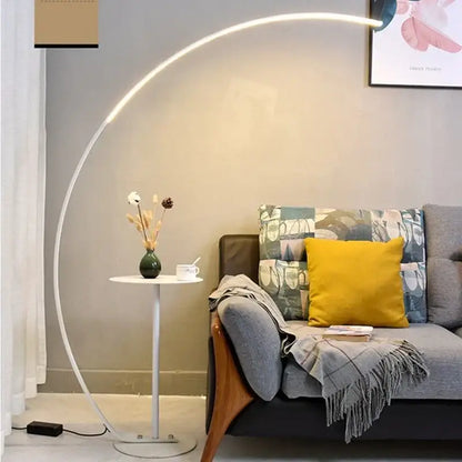 A sleek black minimalist arc floor lamp with a curved white frame and dimmable integrated led lighting for living room
