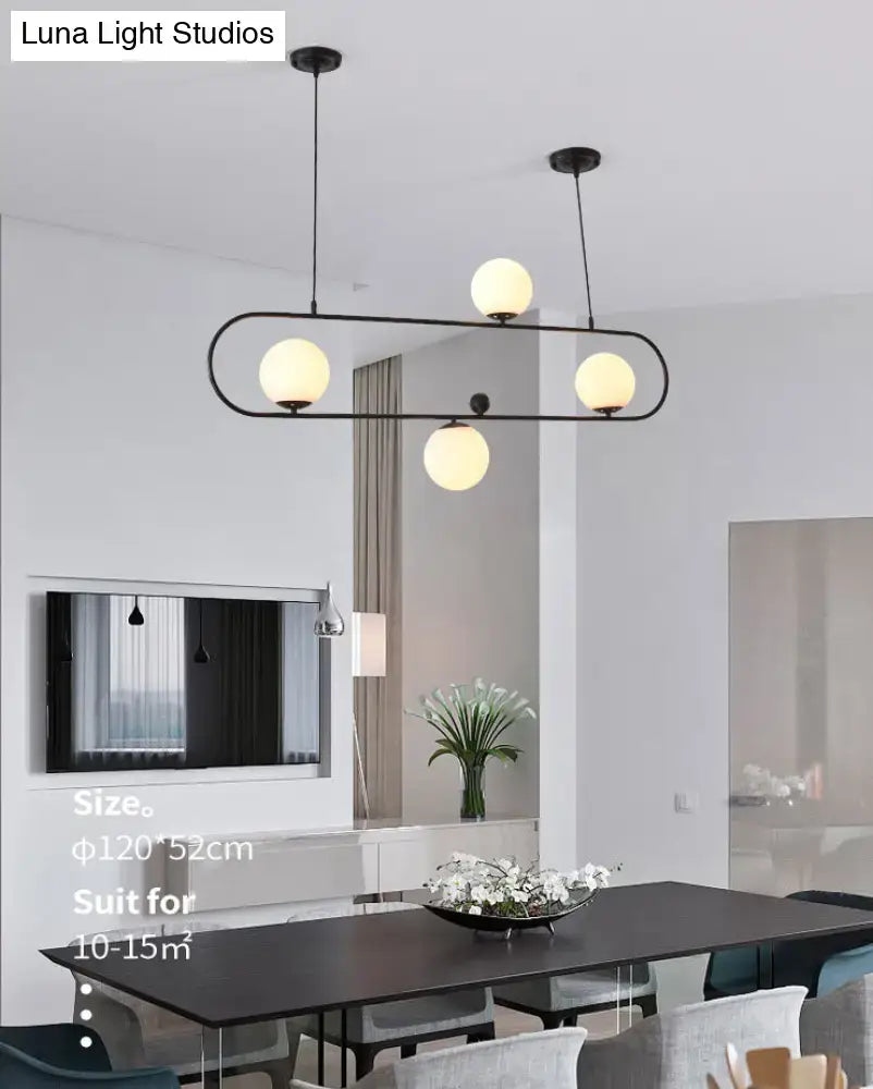 Modern black metal minimalist ellipse ceiling light with four warm white glass globes for living room illumination
