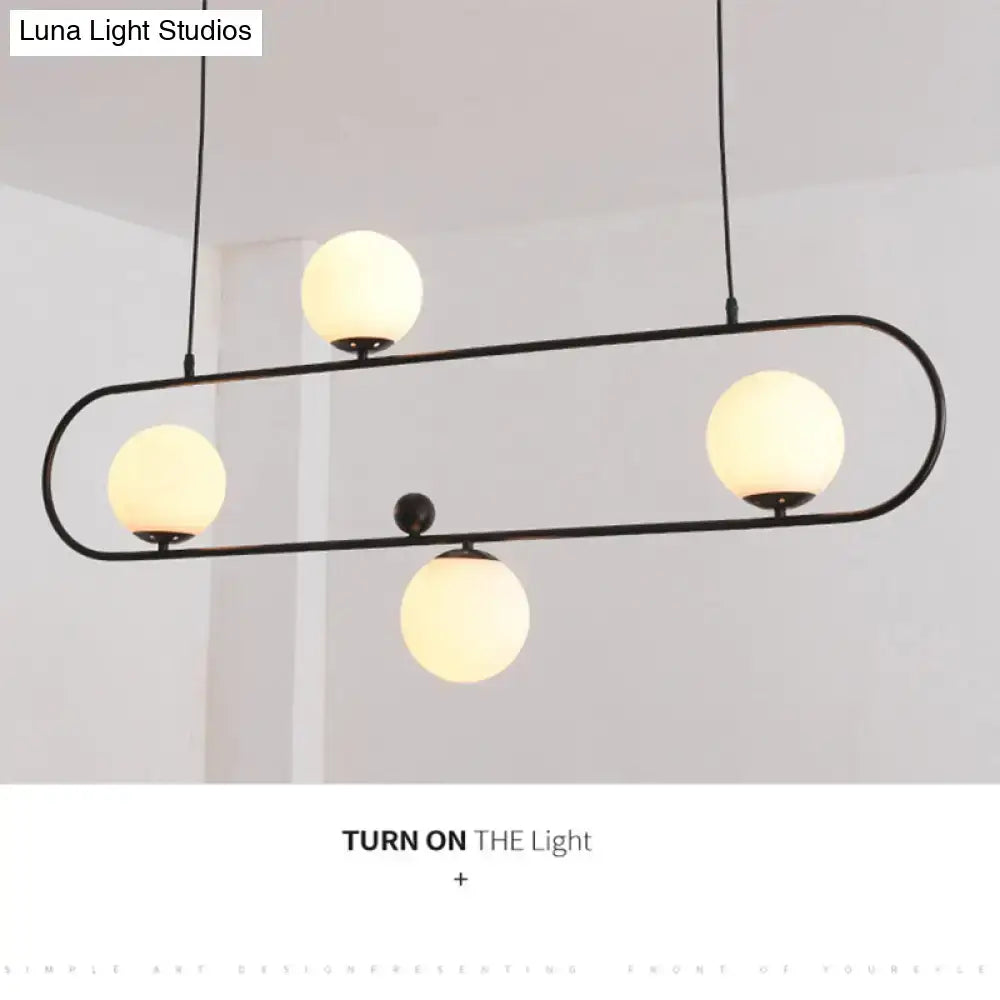 Modern black minimalist ellipse ceiling light with black metal frame and four frosted glass globes for living room