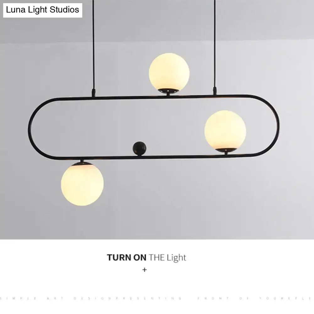 Modern black metal ceiling light with three warm glass globes minimalist ellipse design for living room use