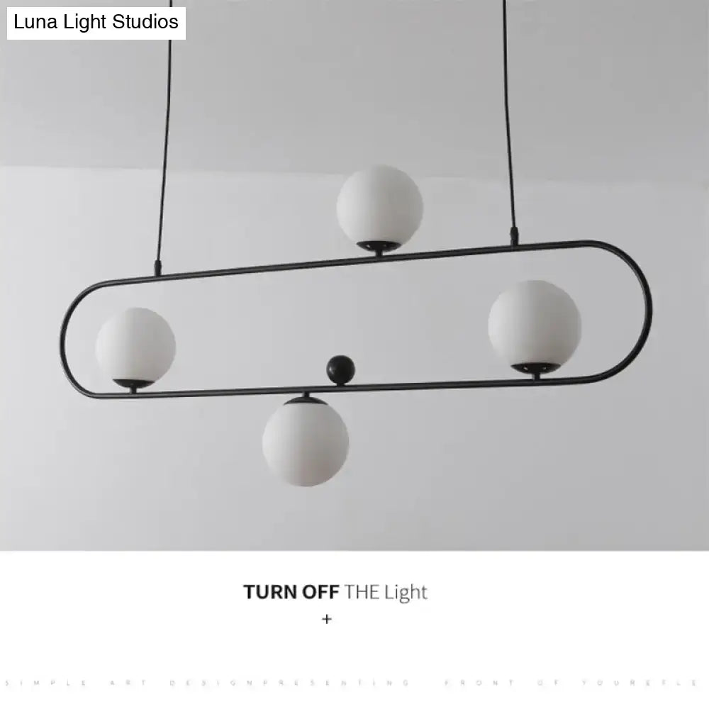 Modern black metal ceiling light with four white glass globes minimalist ellipse design for living room lighting