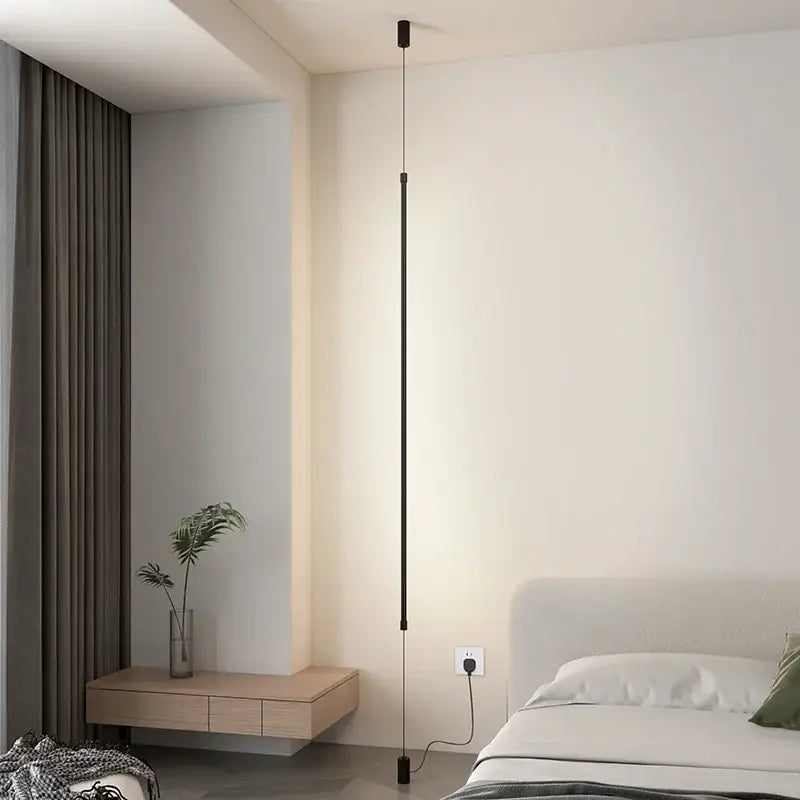 Modern black minimalist led floor lamp featuring a sleek vertical pendant design ideal for living room lighting