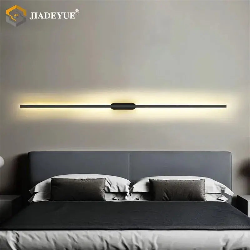 Modern black minimalist led wall lamp with sleek elongated design for warm ambient bedroom lighting decorbites led wall