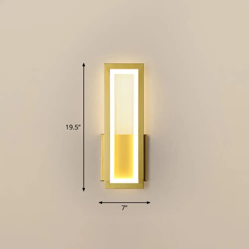 Modern black minimalist wall sconce with gold finish and glowing segmented LED panel for foyer illumination