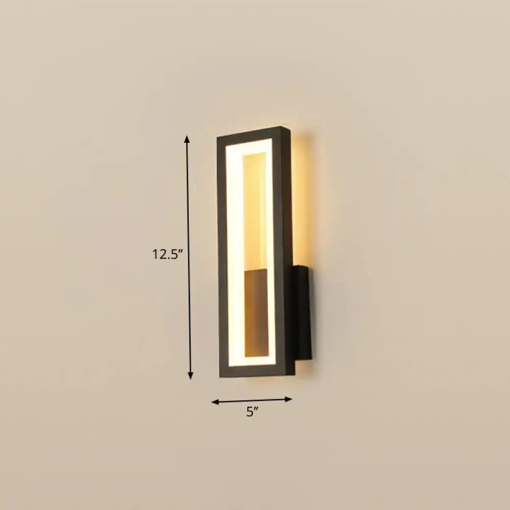 Modern black minimalist led wall sconce with vertical rectangular design and warm light for foyer illumination