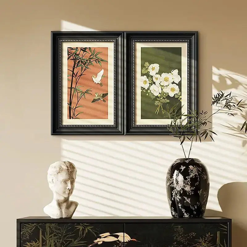 Modern black ceramic vase with white floral and bird patterns used as a decorative painting for electric meter box cover