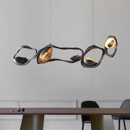 Modern black and gold abstract pendant light with painted iron and organic shapes for dining room selected version