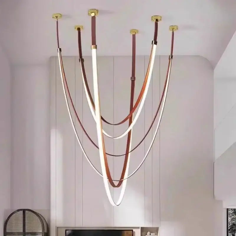 Modern black and orange leather belt pendant light with five curved led strips for modern interiors and color options