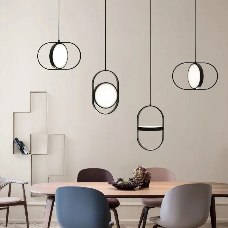 Modern black oval pendant light with minimalist geometric frame and adjustable angle for dining room decorbites adjustable angle