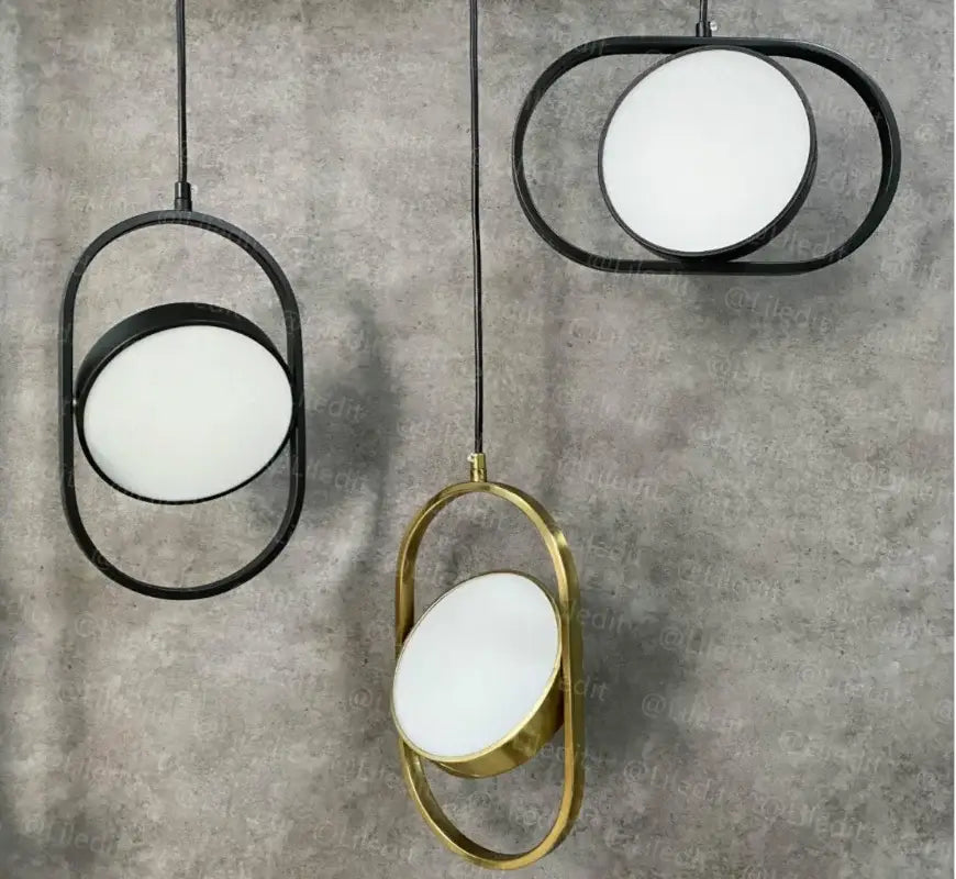 Modern black oval adjustable angle pendant light with sleek metal frame and white glass panels for dining room decorbites adjustable angle