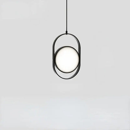 Minimalist black metal decorbites adjustable angle pendant light with glowing circular bulb for shop or kitchen decor