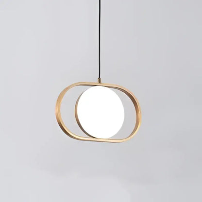Modern black oval adjustable angle pendant light with warm brass frame and glowing circular glass panel for kitchen decorbites adjustable angle pendant