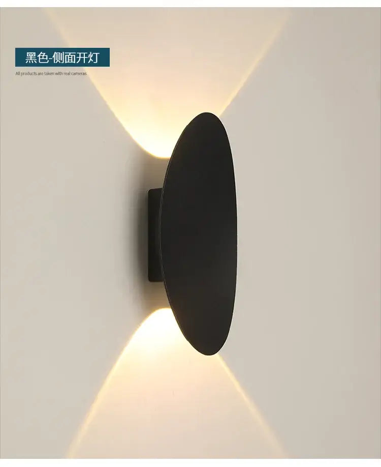 Modern black oval led outdoor porch wall light with black matte finish casting warm v-shaped light decorbites led outdoor