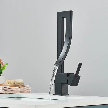 Modern black quartz basin faucet with matte finish single handle mixer tap featuring sleek geometric design