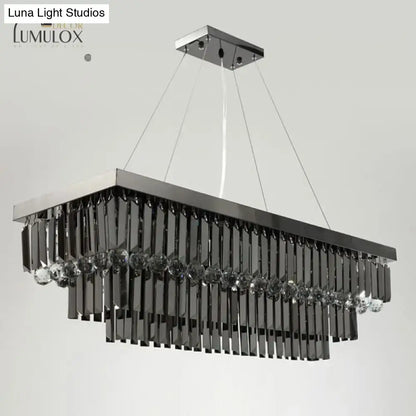 Modern black rectangle crystal chandelier with sleek chrome finish and cascading black crystals accented by clear gemstones
