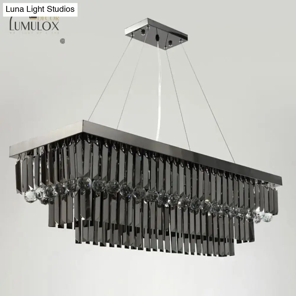 Modern black rectangle crystal chandelier by DecorBites with sleek chrome finish and cascading black crystal prisms
