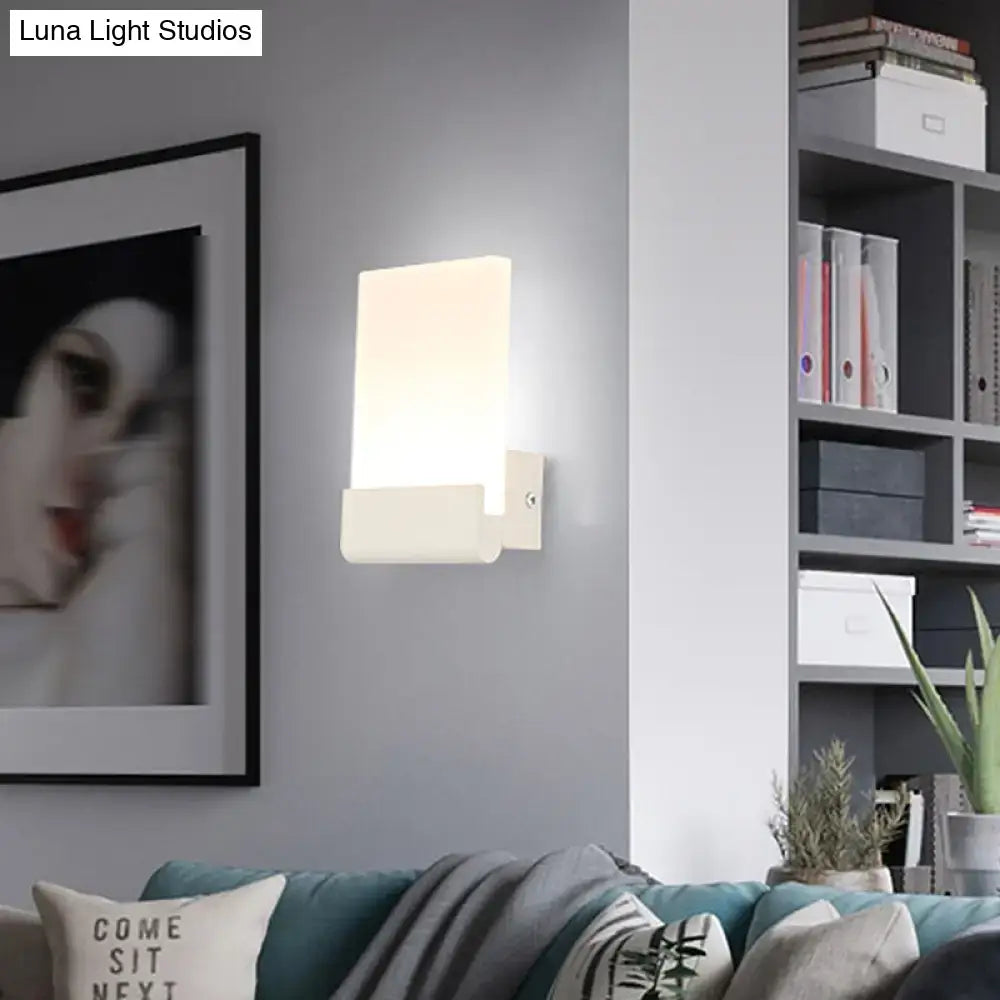 Modern white rectangular wall sconce with sleek minimalist design and light bulbs included for bedroom use