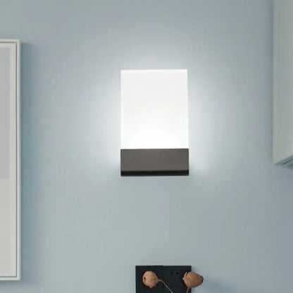 Modern black rectangle led wall sconce with frosted white diffuser and matte black base light bulbs bulb included