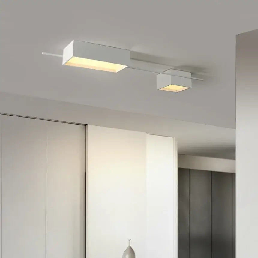Modern black rectangular led ceiling lights with two white square lamps emitting warm illumination for living room decoration