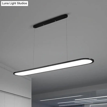 Modern black DecorBites™ ulta-thin LED island lamp with acrylic shade and adjustable cord length for minimalistic lighting