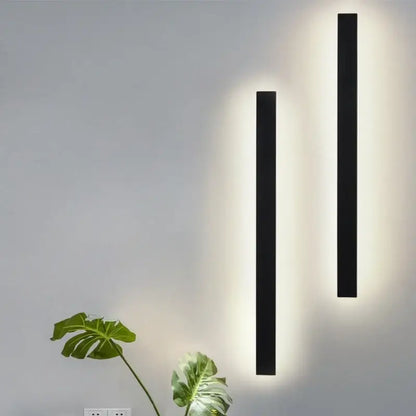 Modern black rectangular led wall light featuring two sleek sconces with warm diffused glow for living room decorbites wall light