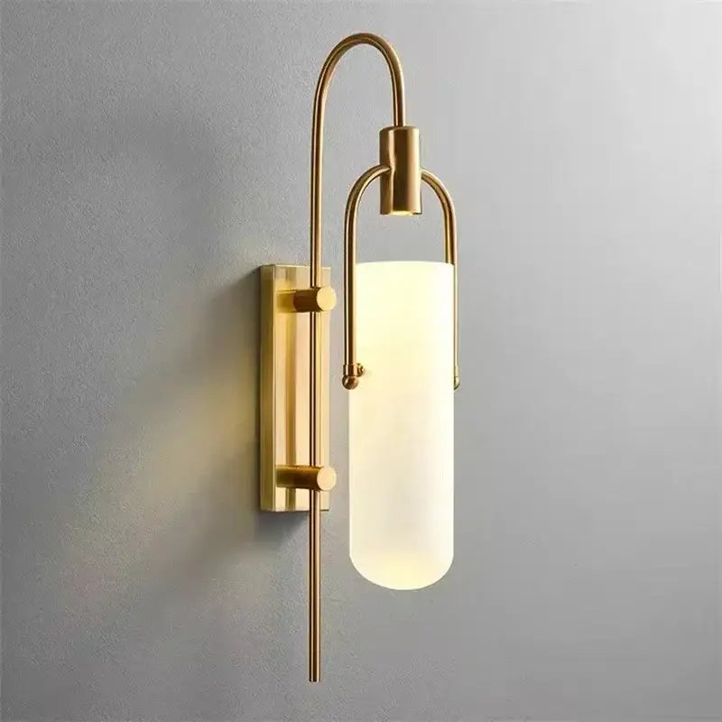 Modern black and red glass shade led wall lamp with gold-toned metal frame and opaque white cylindrical glass shade