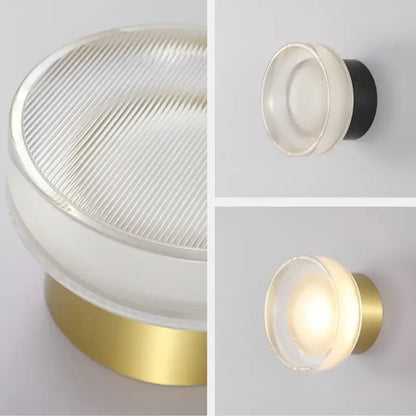 Modern black ribbed glass wall sconce with frosted glass diffuser and sleek brass base for decorbites elegant glass led lighting