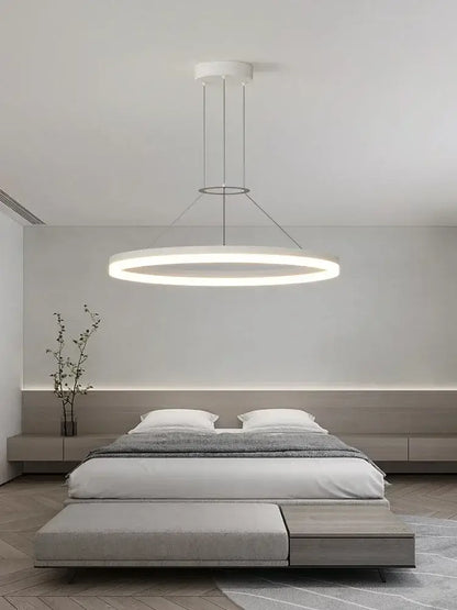 Minimalist white circular pendant chandelier with sleek design for living room featuring decorbites black ring style lighting