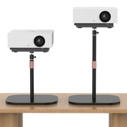 Two white lg projectors on modern black and rose gold decorbites adjustable height monitor stands for office use