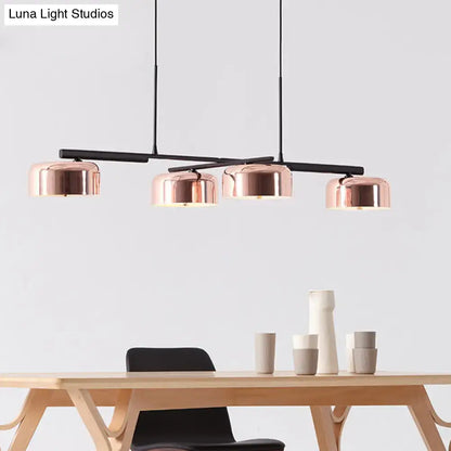 Modern black rose gold diner island lamp with copper-finished pendant lights and four dome-shaped shades