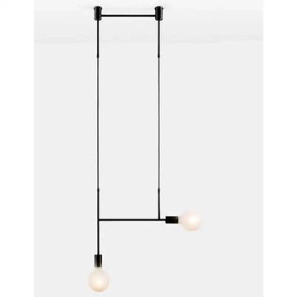 Modern black rose gold minimalist pendant light with two exposed bulbs suspended by slender rods for dining room decorbites black rose