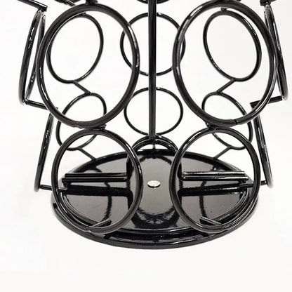 Modern black rotatable dolce gusto capsule rack made of metal wire with circular loops and glossy finish for kitchen storage