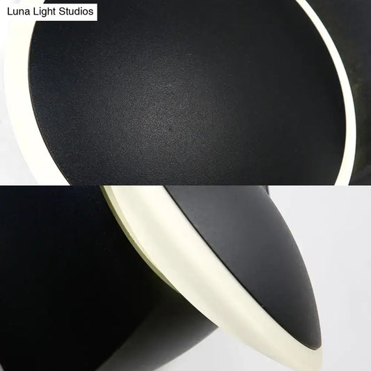 Modern black rotatable led wall sconce with matte finish and integrated white led ring for bedroom lighting