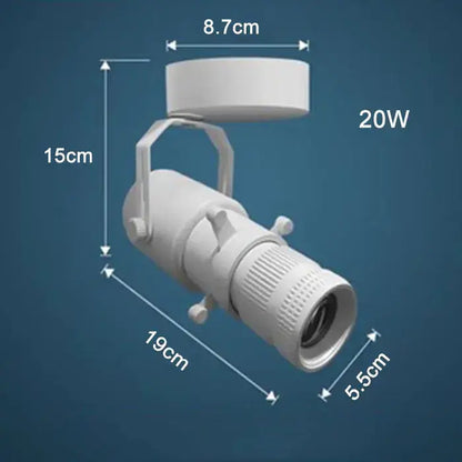 White 20w adjustable led track spotlight with cylindrical body and textured lens housing for decorbites adjustable led use
