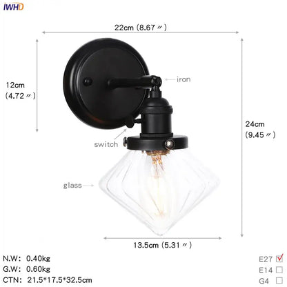 Modern black iron wall sconce with a faceted clear glass ball shade ideal for decorbites glass ball wall lighting
