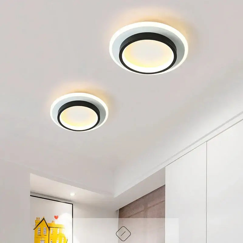 Modern black square led ceiling lamp with sleek white and black circular lights emitting warm ambient glow decorbites led ceiling
