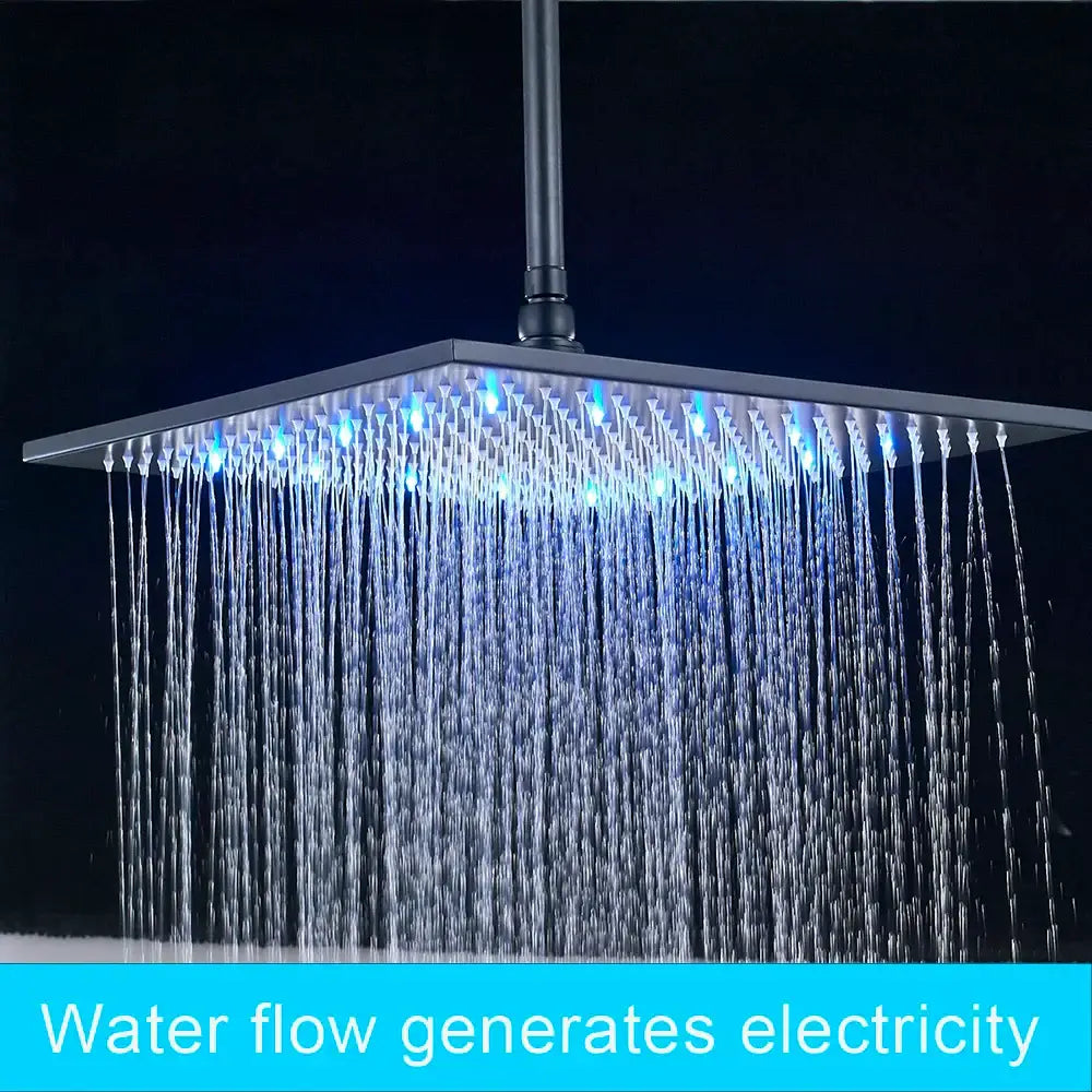 Modern black square shower faucet set with led rainfall head featuring blue led lights and cascading water flow