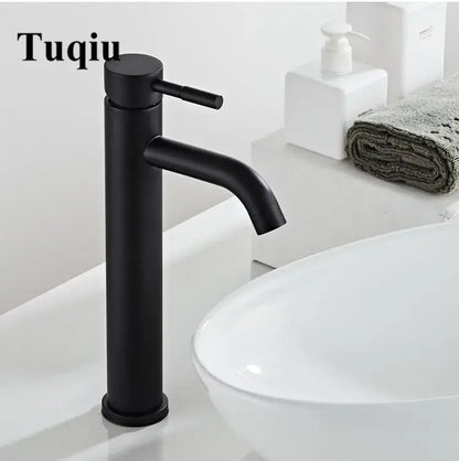Modern black stainless steel basin faucet with a black matte finish and sleek cylindrical minimalist design by decorbites