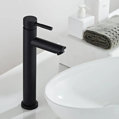 Modern black stainless steel basin faucet with matte finish and sleek minimalist design for bathroom use by decorbites